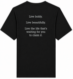 Black t-shirt with motivational quote on the back against a white background